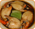 Crab's claws in brown soup